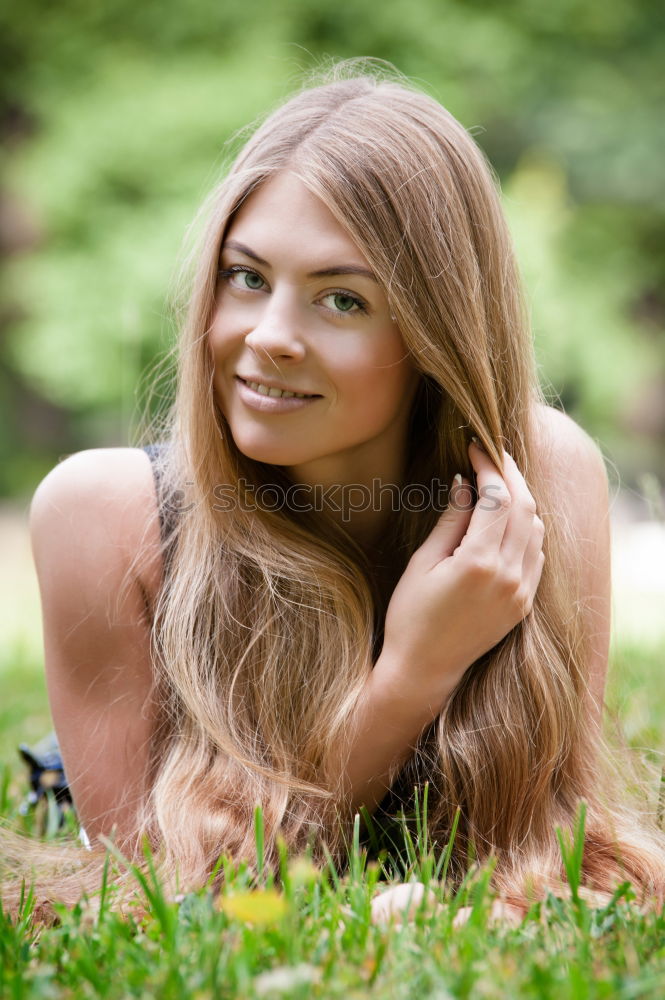 Similar – Pretty happy woman with red long hair