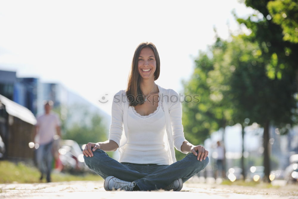 Similar – Image, Stock Photo Young woman doing yoga in nature.