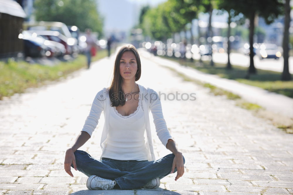 Similar – Image, Stock Photo Young woman doing yoga in nature.