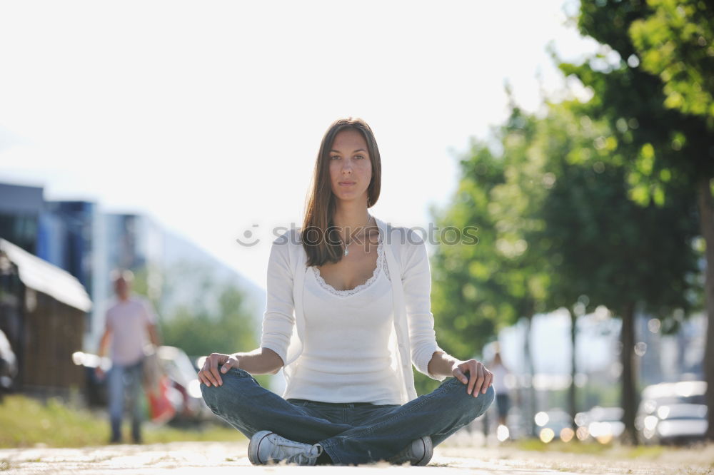 Similar – Image, Stock Photo Young woman doing yoga in nature.