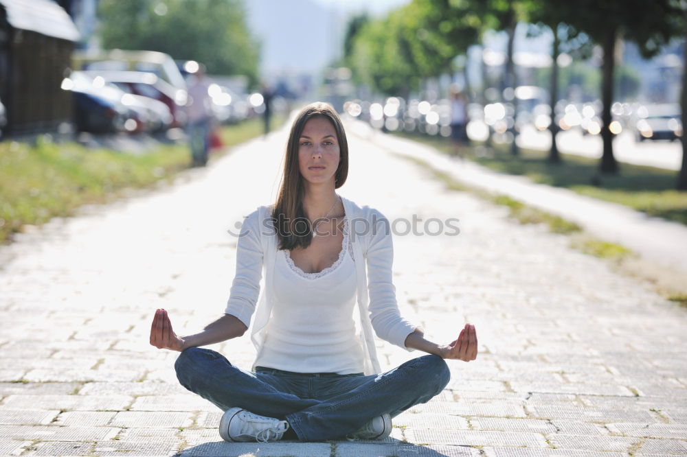 Similar – Image, Stock Photo Young woman doing yoga in nature.