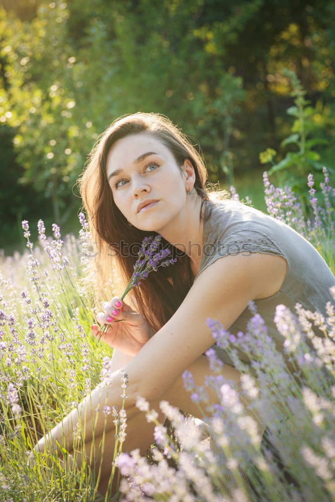 Similar – Summer portrait of long haired teen girl with short jeans shorts and belly top in park