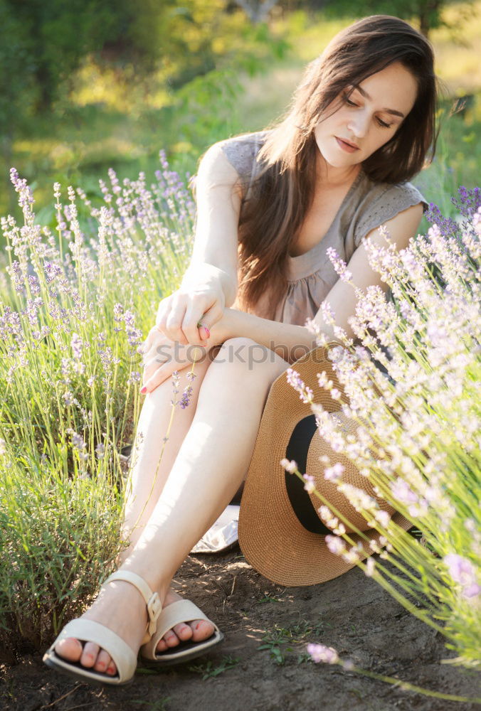 Similar – Image, Stock Photo Young woman is packing her backpack during hiking in summer nature. Concepts of adventure, extreme survival, orienteering. Equipments for hike.