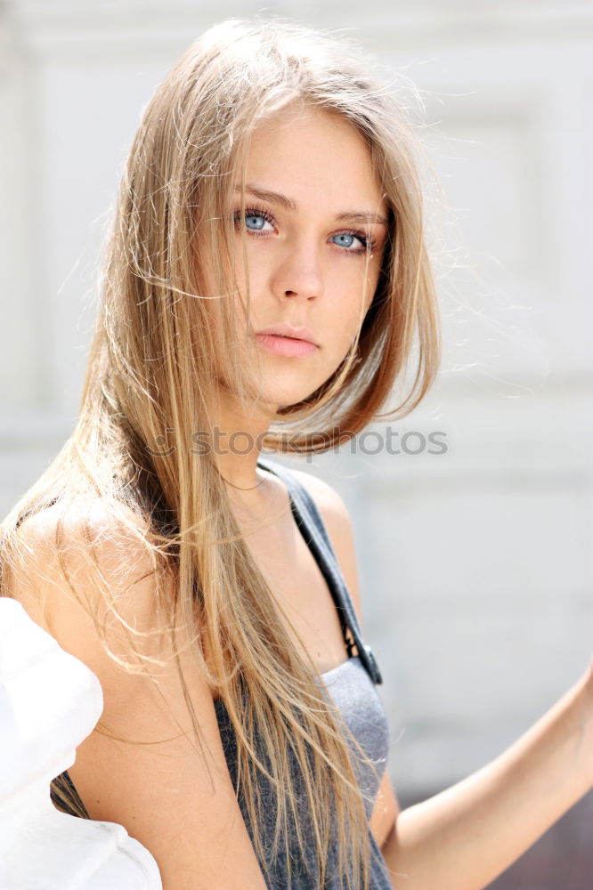 Similar – Smiling young woman in urban background.