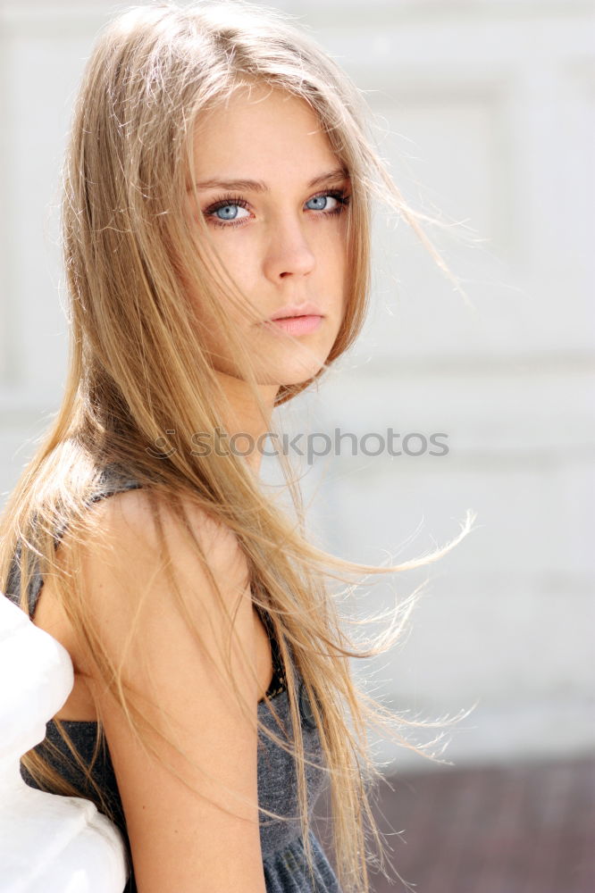 Similar – Image, Stock Photo Young blonde girl wearing casual clothes outdoors