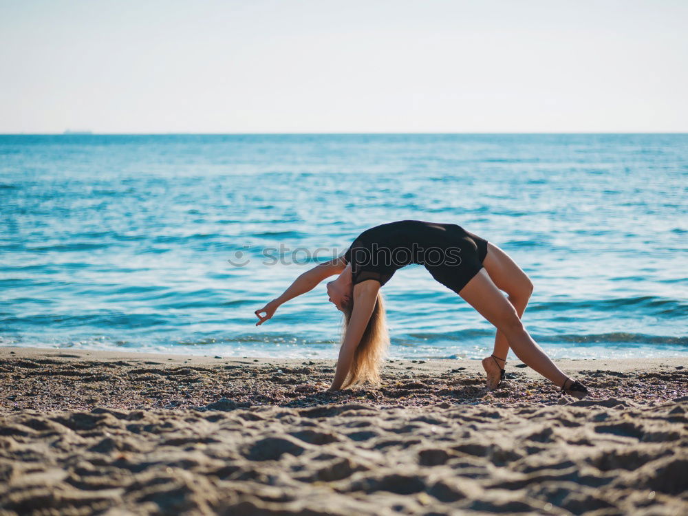 Similar – Anonymous female kicking air on seashore