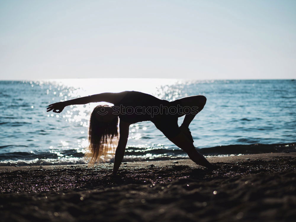 Similar – Anonymous female kicking air on seashore