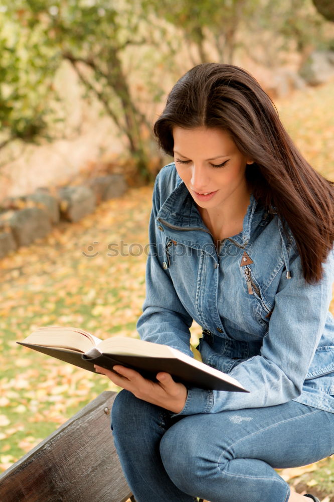 Similar – pretty young woman reading a book