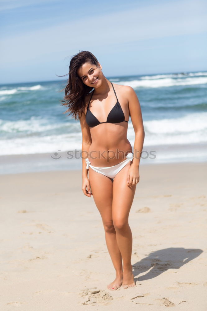 Similar – Young female african athlete on beach with soccer ball