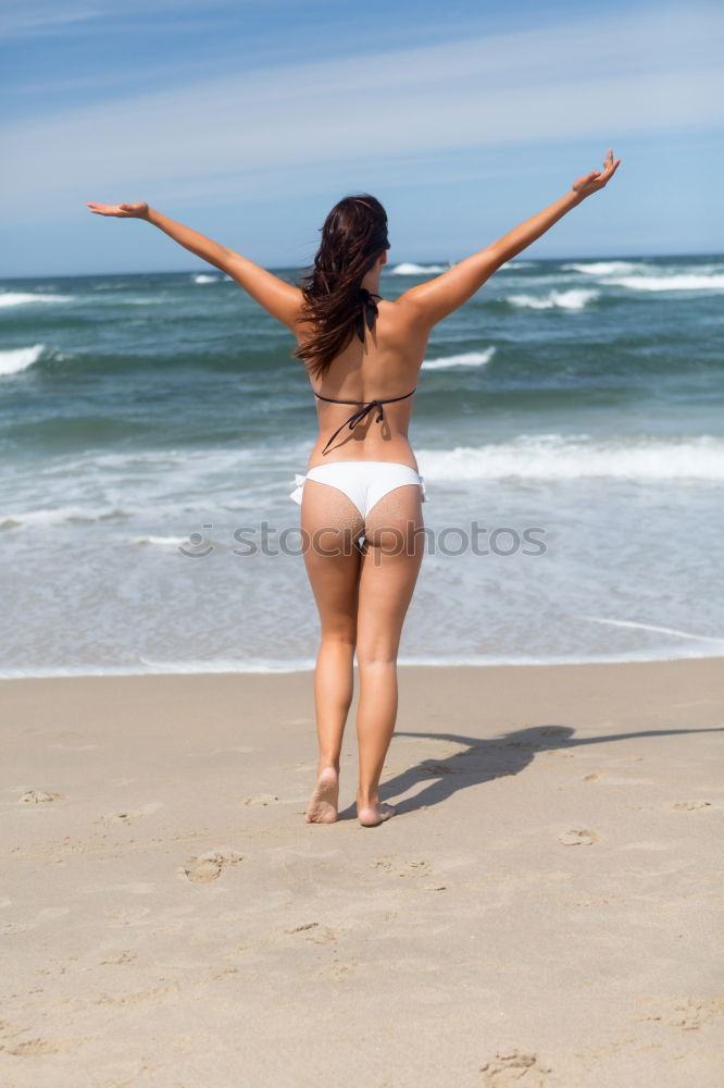 Similar – Image, Stock Photo Surfer girl on standing on the beach