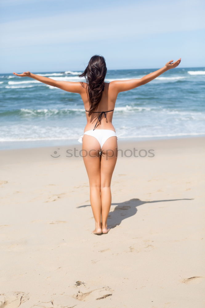 Similar – Image, Stock Photo Surfer girl on standing on the beach