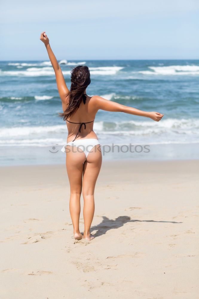 Similar – Image, Stock Photo Surfer girl on standing on the beach