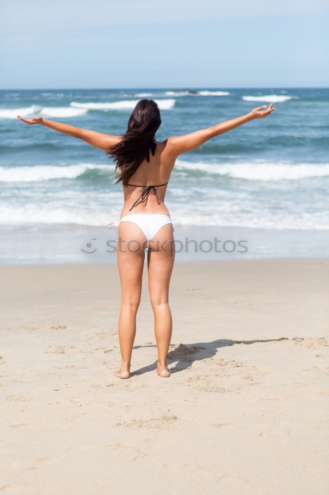 Similar – Image, Stock Photo Surfer girl on standing on the beach