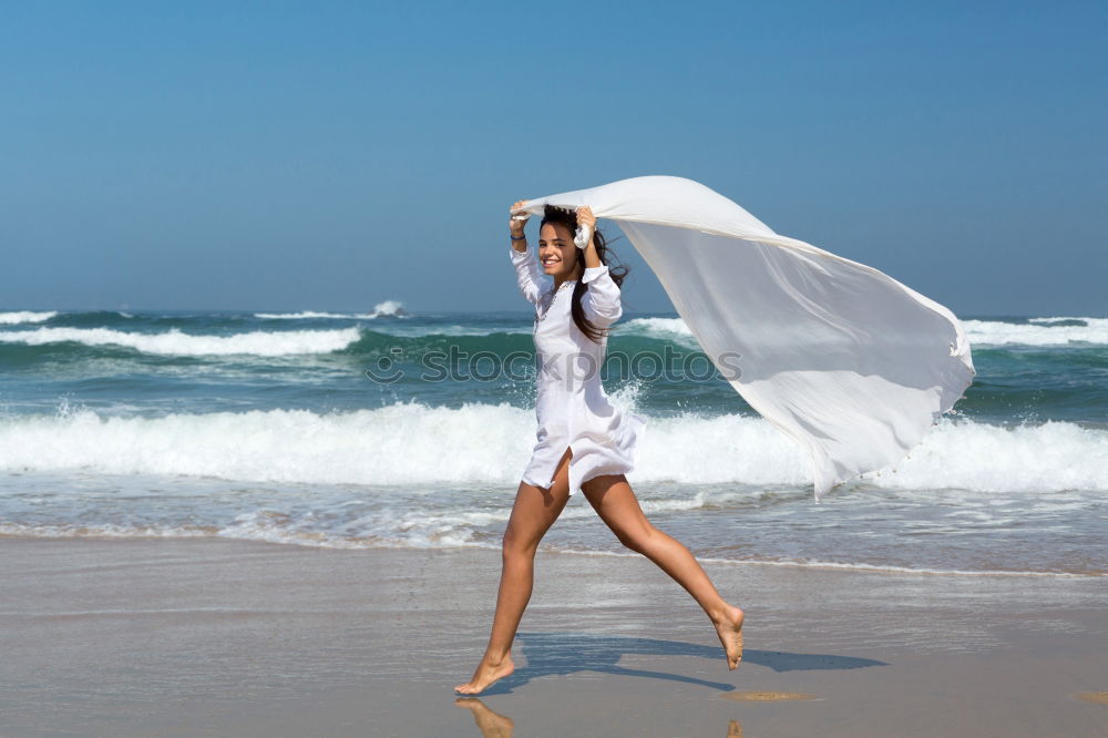 Similar – Image, Stock Photo Bride on the beach Wedding