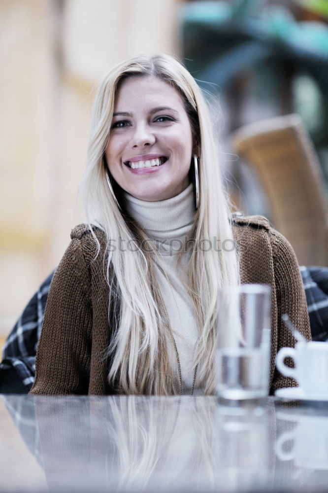 Similar – Happy young blond woman standing on urban background