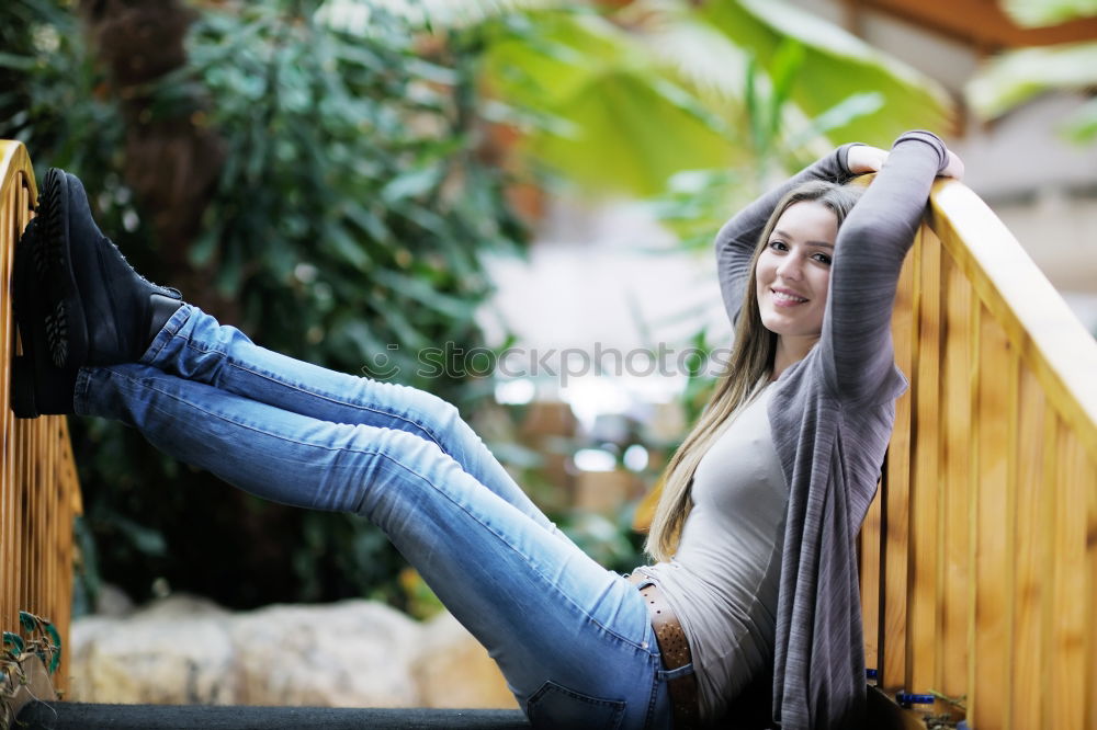 Similar – Young woman hidden behind a plant