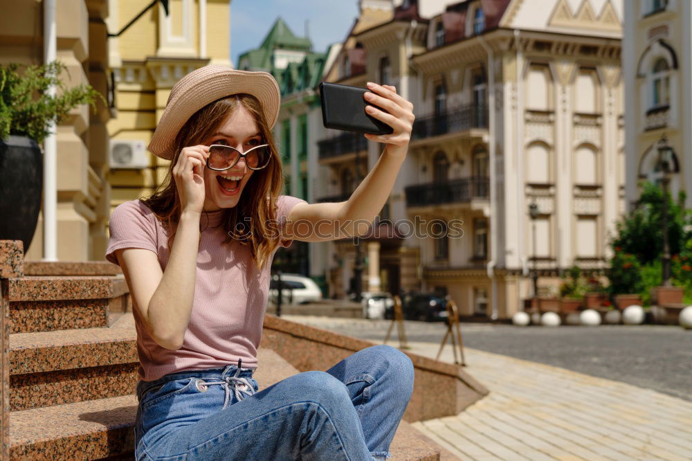 Similar – Image, Stock Photo two friends in the street taking pictures with mobile phone