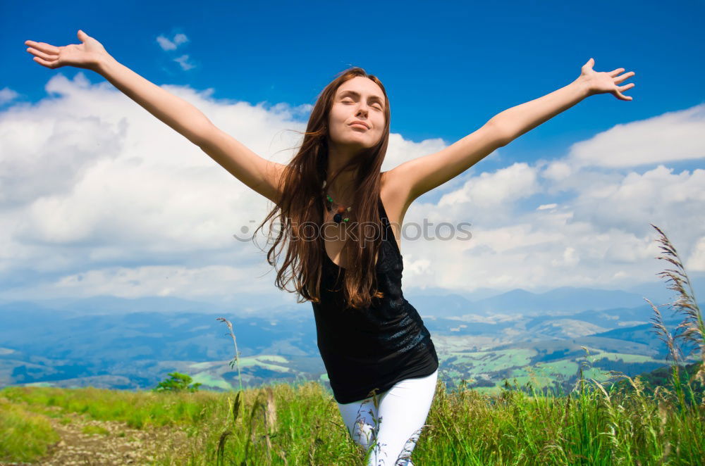 Similar – Young woman jumping in nature