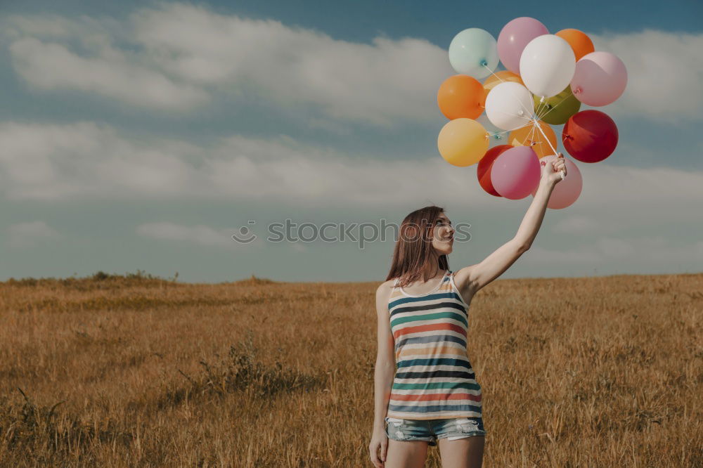 Similar – Girl with balloons