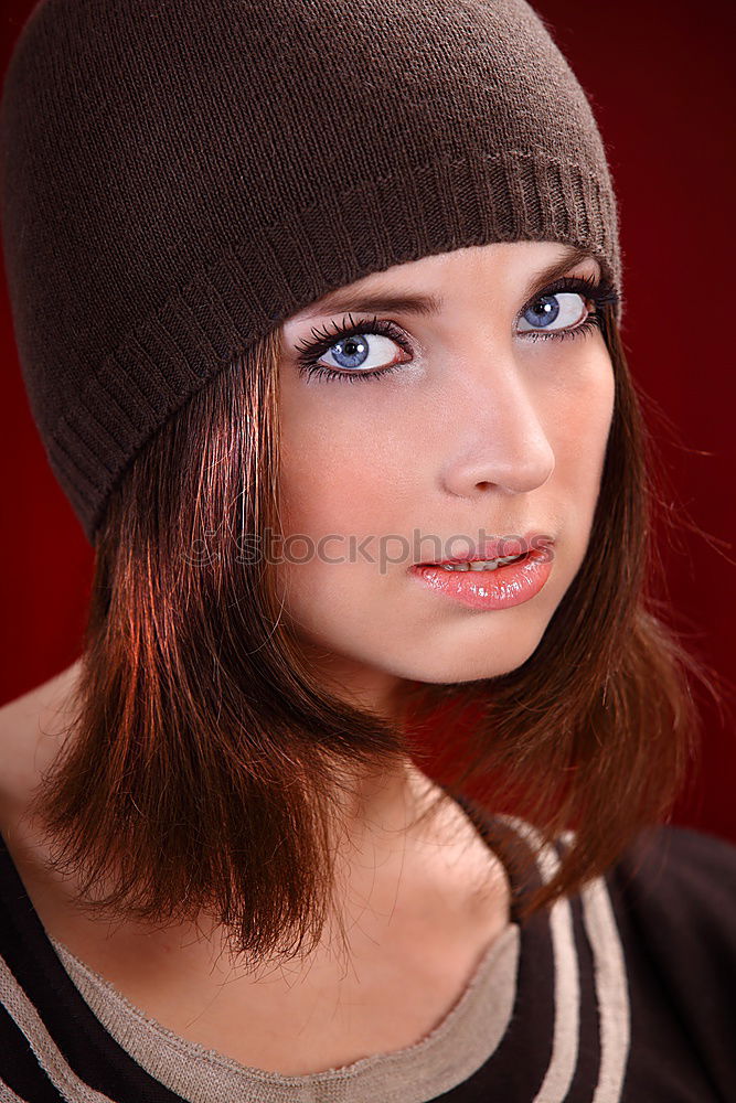 Similar – young woman with bun, forehead fringes and scarf