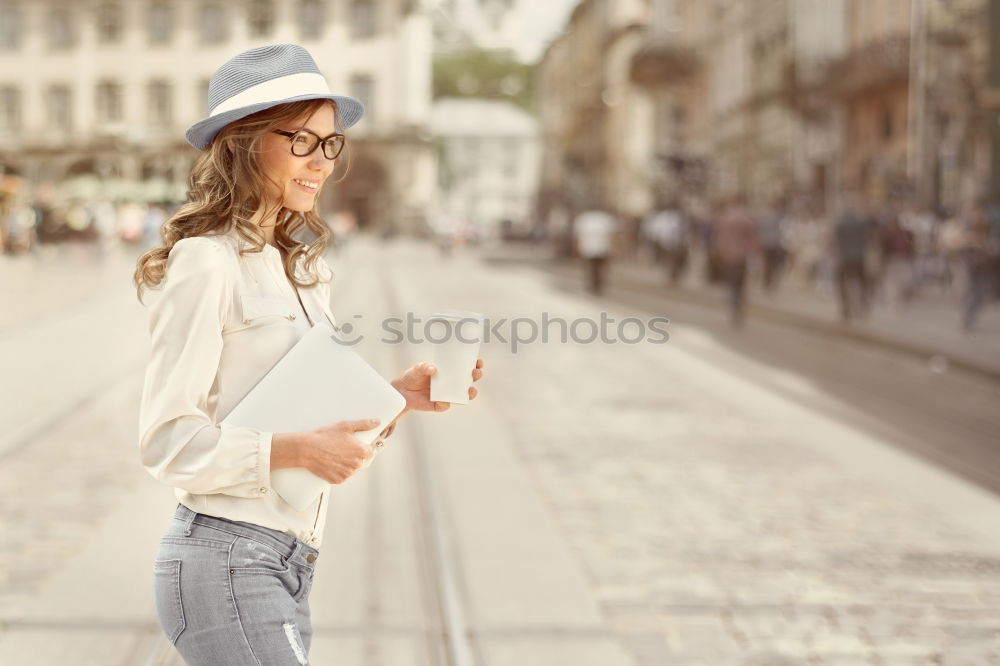 Similar – Image, Stock Photo Portrait of a Young woman using her mobile phone.