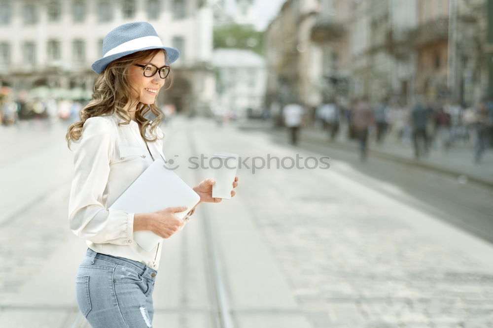 Similar – Young black woman with shopping bags in the street.