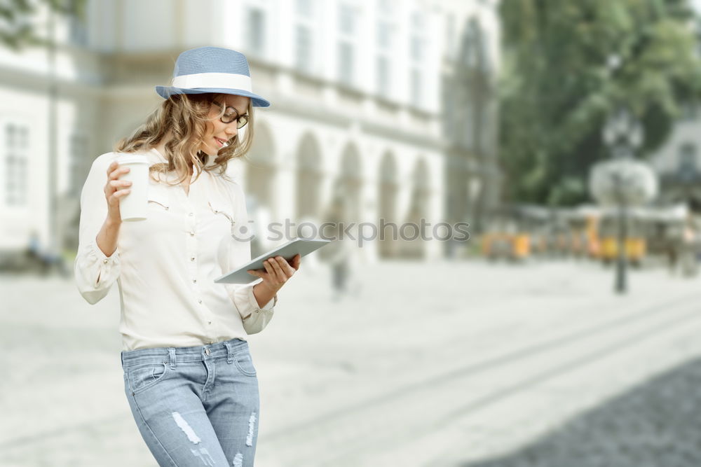 Image, Stock Photo Portrait of a Young woman using her mobile phone.