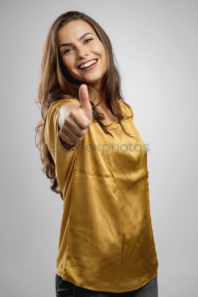 Similar – Image, Stock Photo Happy woman sitting outdoors putting her hand near the camera.