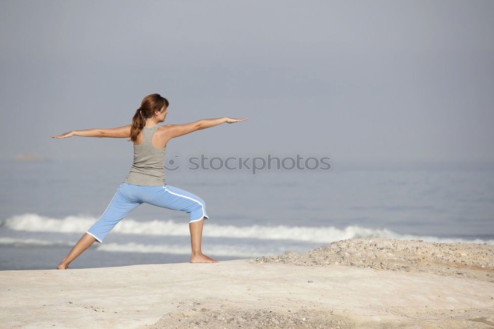 Similar – Image, Stock Photo Caucasian blonde woman practicing yoga in the beach