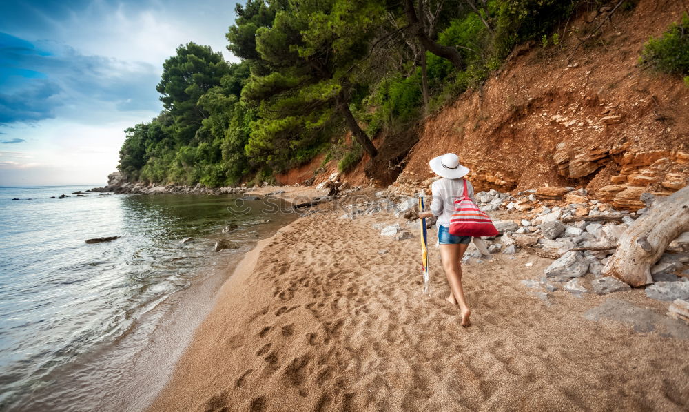 Similar – Image, Stock Photo Mother and little daughter having fun on the beach of the Wall of Puerto Sherry