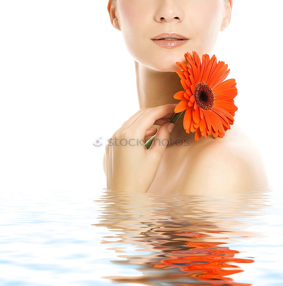 Similar – Woman lying in bathtub filled with flowers and fruits