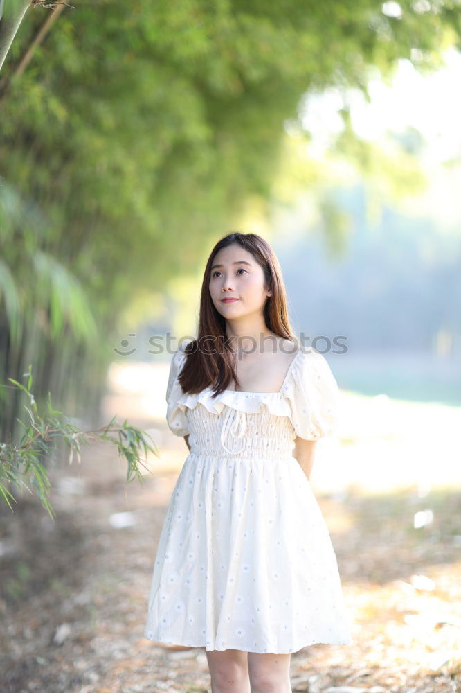 Similar – Image, Stock Photo beautiful young asian girl have a happy time alone