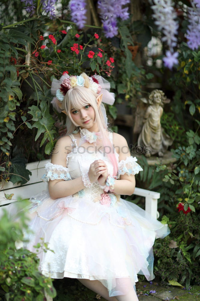 Similar – Image, Stock Photo kiss me …. young brunette woman dressed like a princess looks skeptically at a frog on her hand and considers whether to kiss it