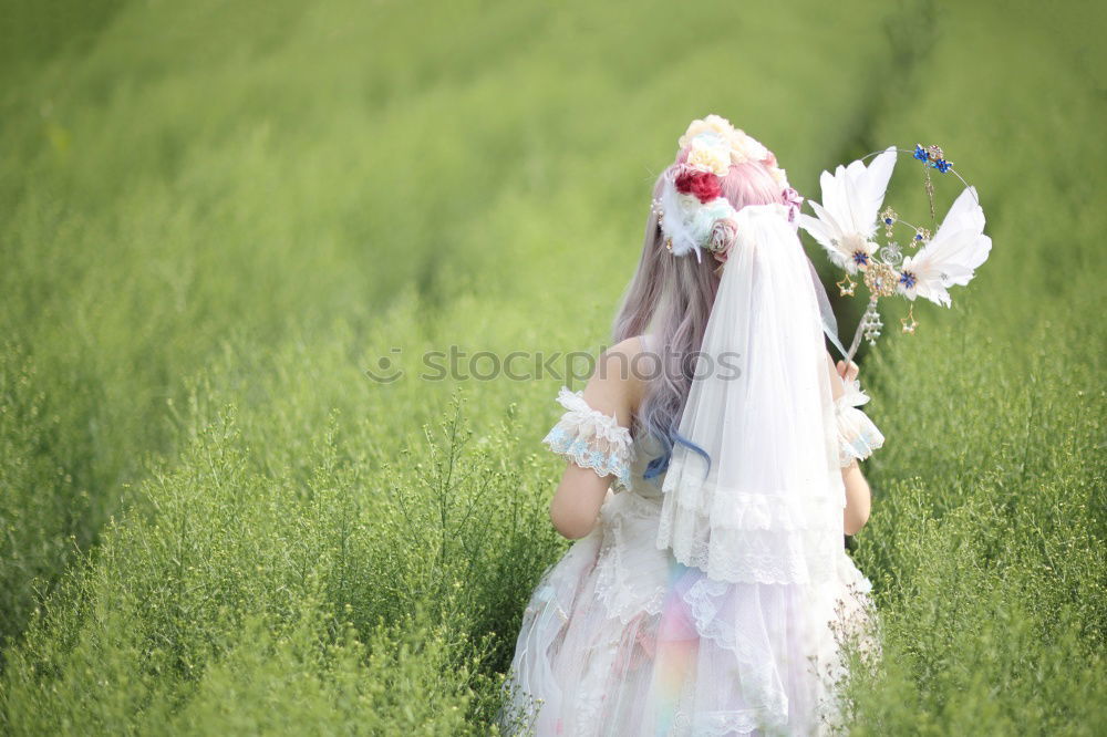 Similar – Image, Stock Photo Girl in rain boots with flowers outdoor