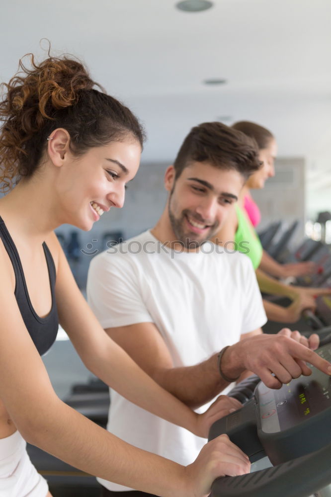 Image, Stock Photo Attractive Woman with headphones on treadmill in the gym