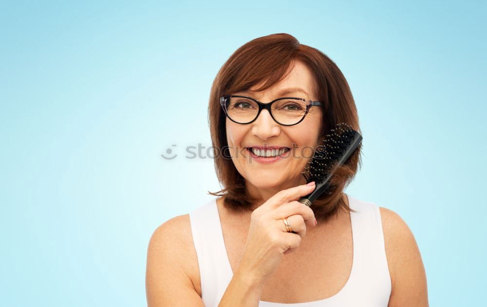 Similar – Image, Stock Photo Happy elderly woman on the mobile phone