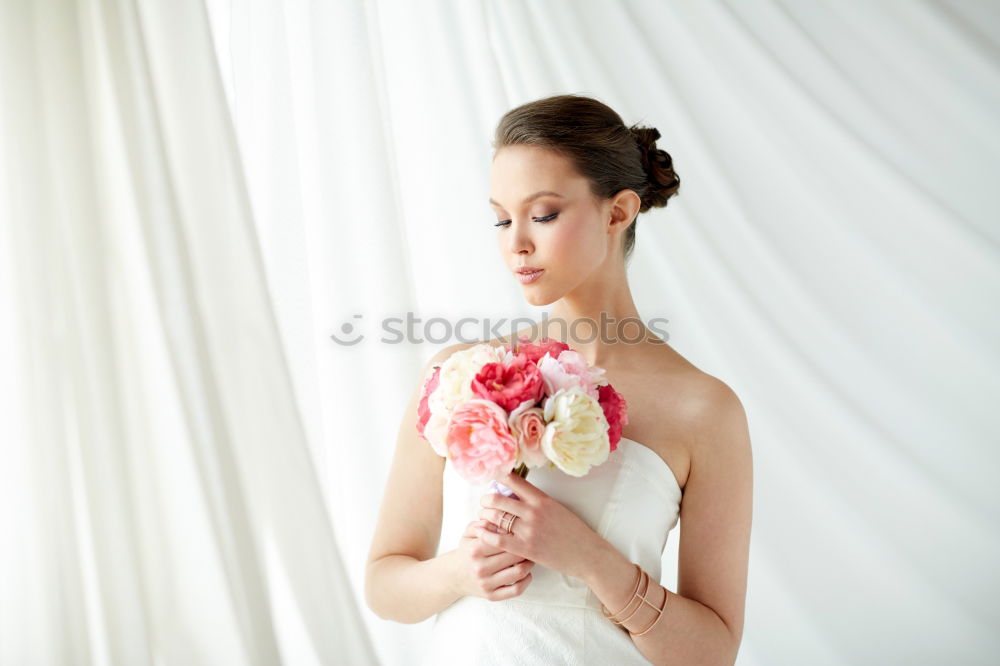 Similar – Image, Stock Photo Bride trying on wedding dress.