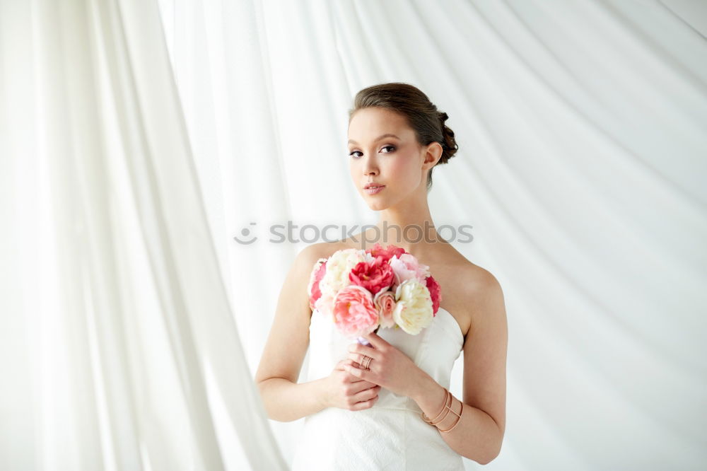 Similar – Image, Stock Photo Bride trying on wedding dress.