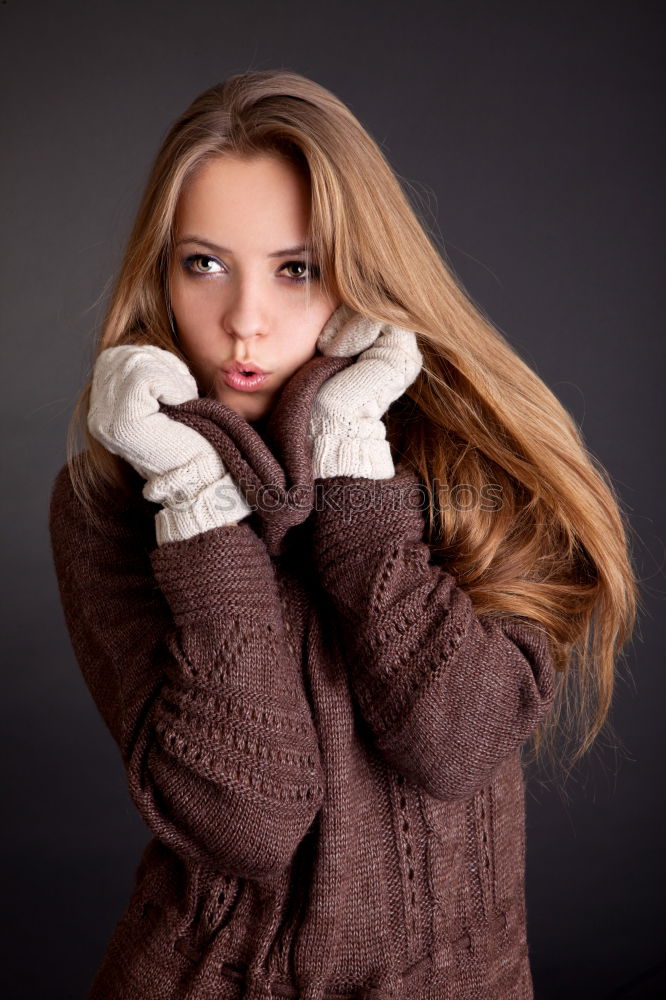 Similar – portrait Young pretty woman in winter in a log cabin in the snow