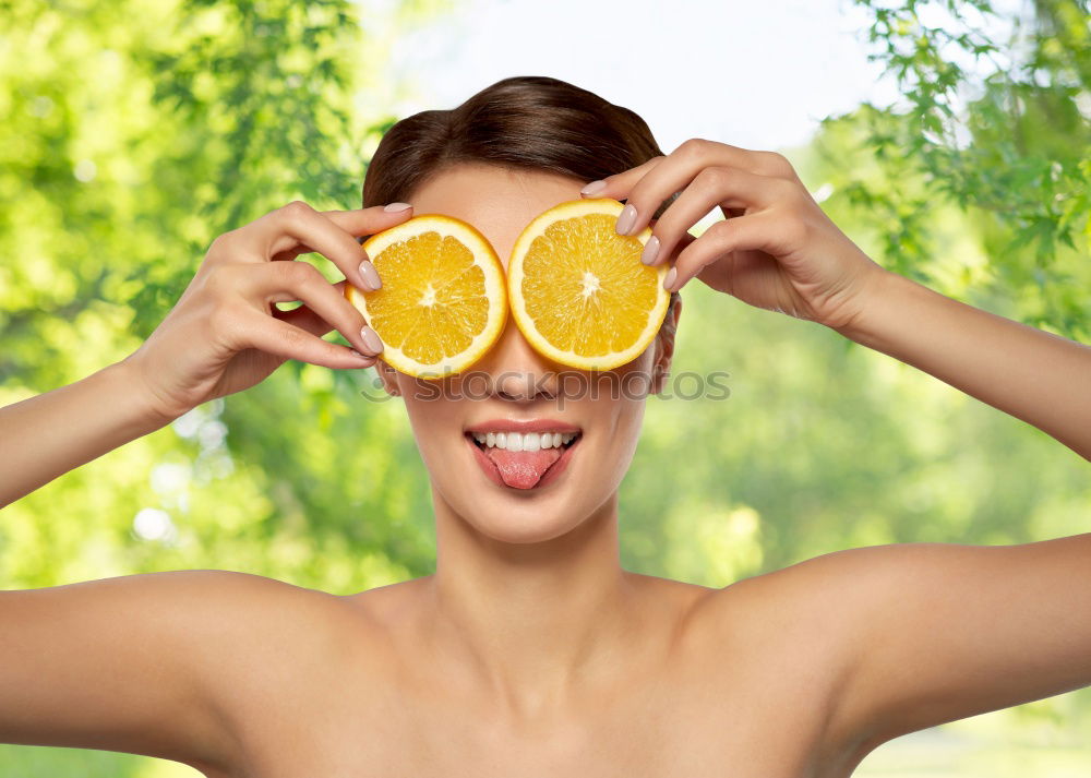 Similar – Smiling woman between slices of orange