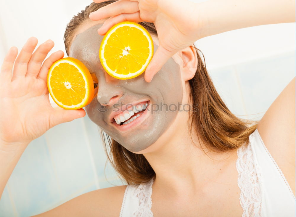 Similar – Smiling woman between slices of orange