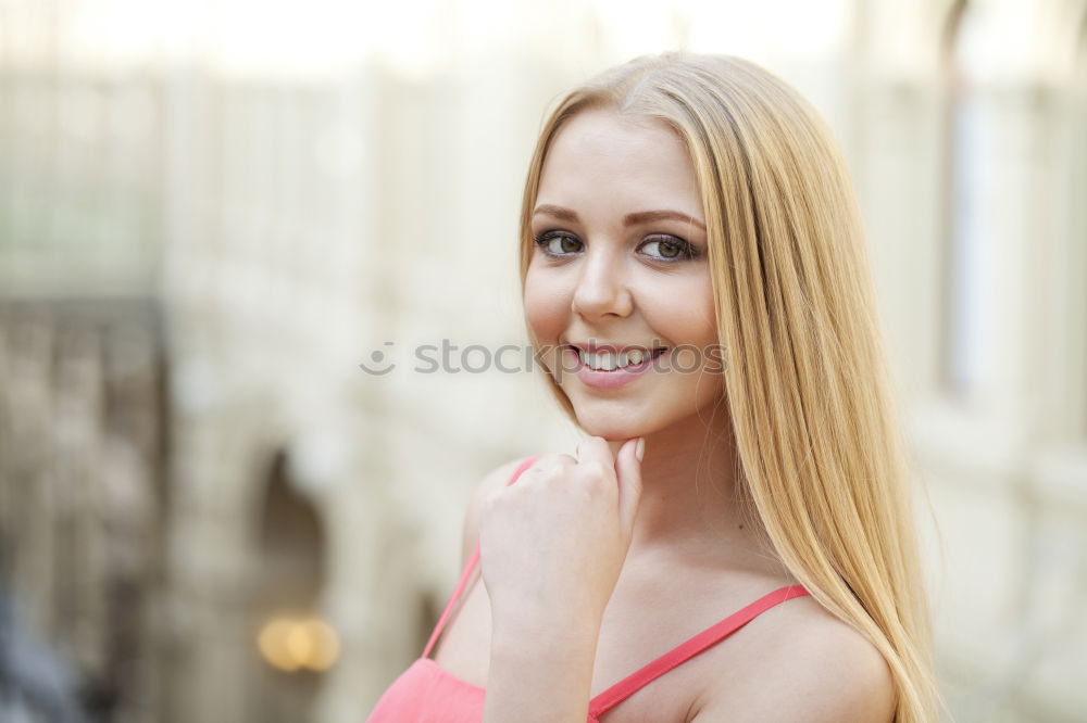 Similar – Smiling young woman in urban background.