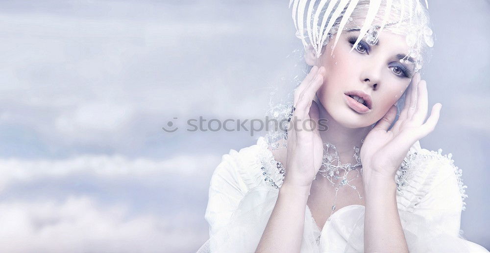 Young alternative woman is eating a cotton candy