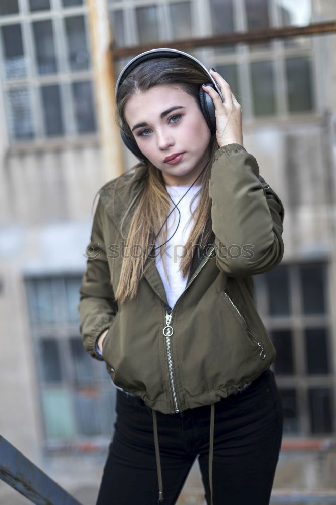 Similar – Image, Stock Photo Young girl with headphones standing on the street