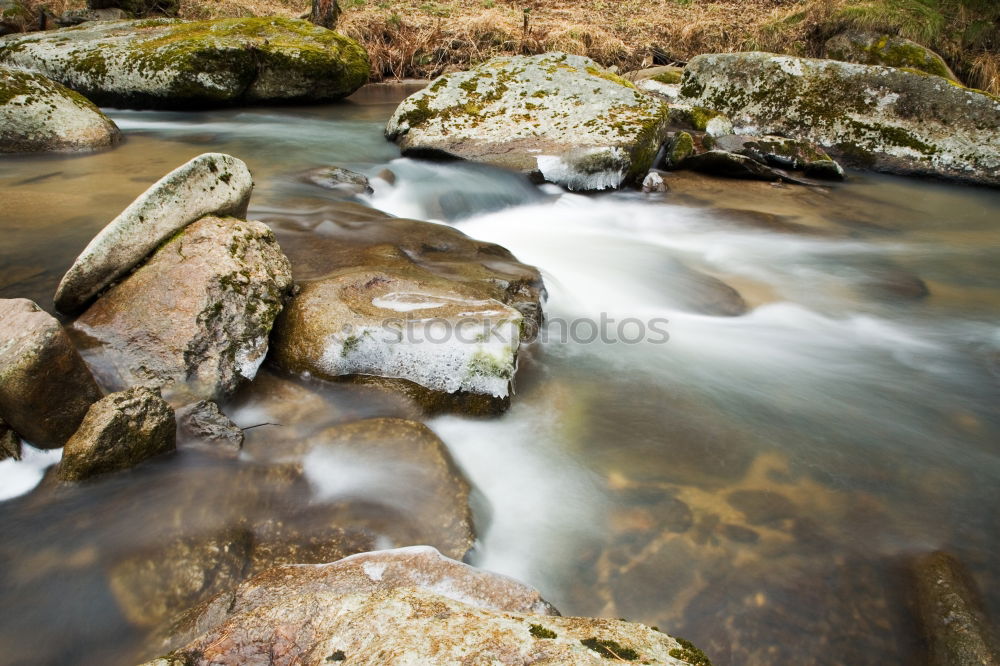 Similar – Stones in the riverbed