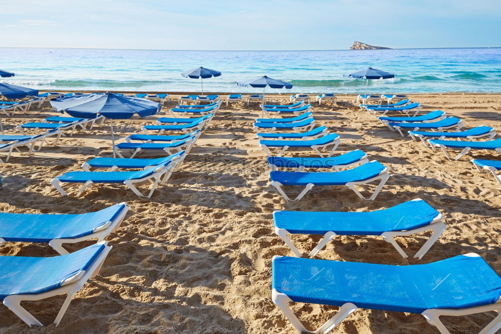 Similar – Empty deckchairs on the beach