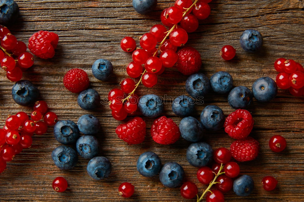 Similar – Image, Stock Photo Blue and raspberries on slate plate