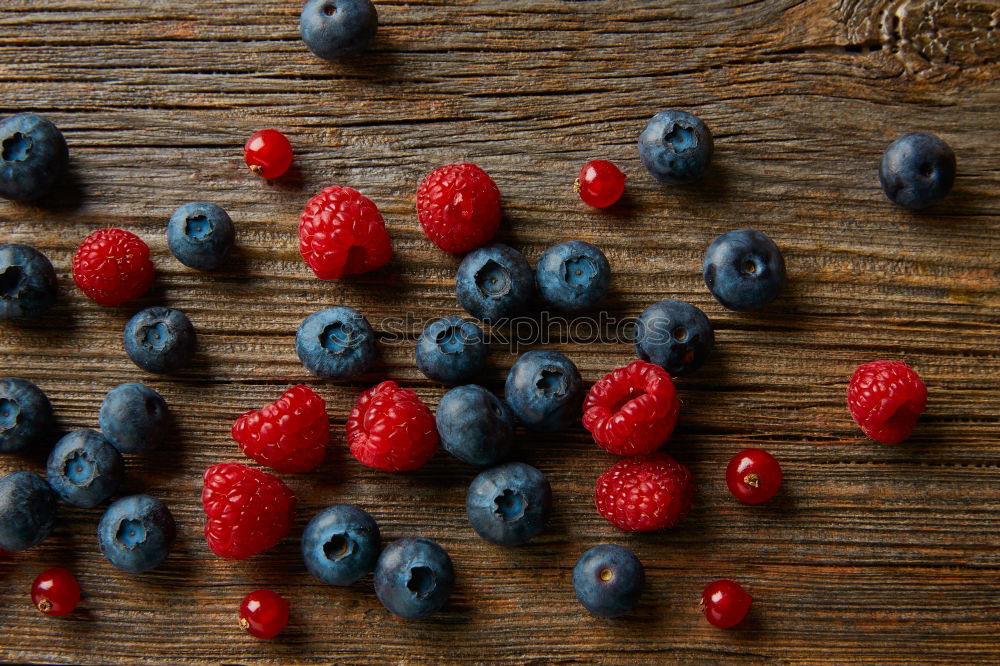 Similar – Image, Stock Photo Various berries in painted jam jar