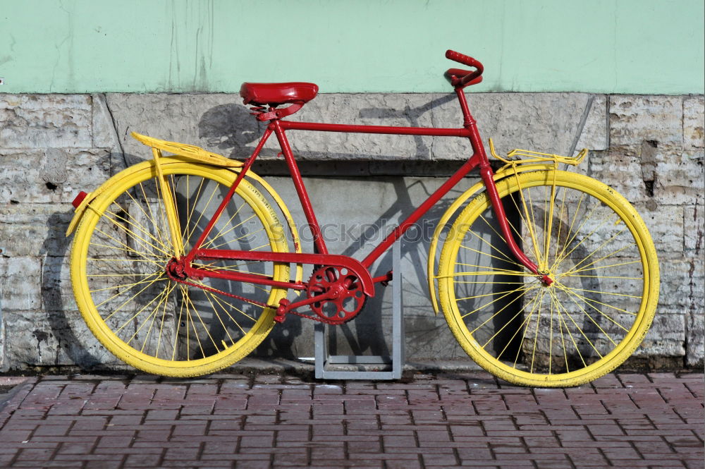 Similar – Rainbow bicycle chained