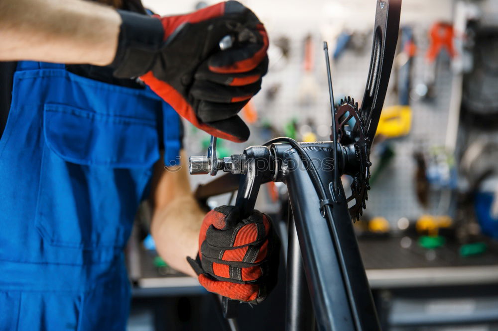 Similar – Professional Mechanic Repairing Car Engine.